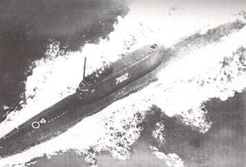 A black and white photograph of the Hughes Glomar Explorer ship in the water.